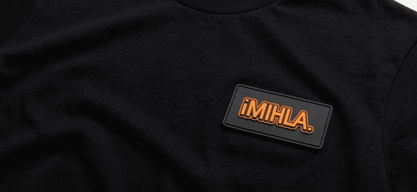 iMIHLA. Signature Tee — Black with Orange PVC patch